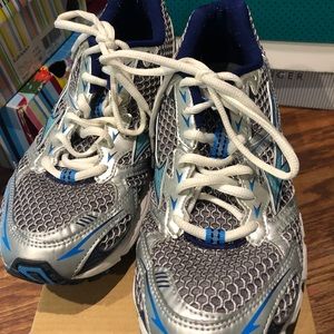 Blue and silver Mizuno Wave Runner running shoes